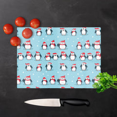 Adorable Santa Penguins Glass Chopping Board