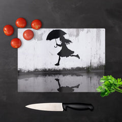 Jumping Over Puddles Chopping Board