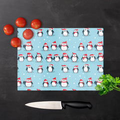 Adorable Santa Penguins Glass Chopping Board