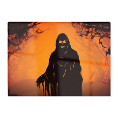A Spooky Black And Orange Ghost Glass Chopping Board