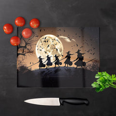 Witches Riding Broomsticks Glass Chopping Board