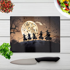 Witches Riding Broomsticks Glass Chopping Board